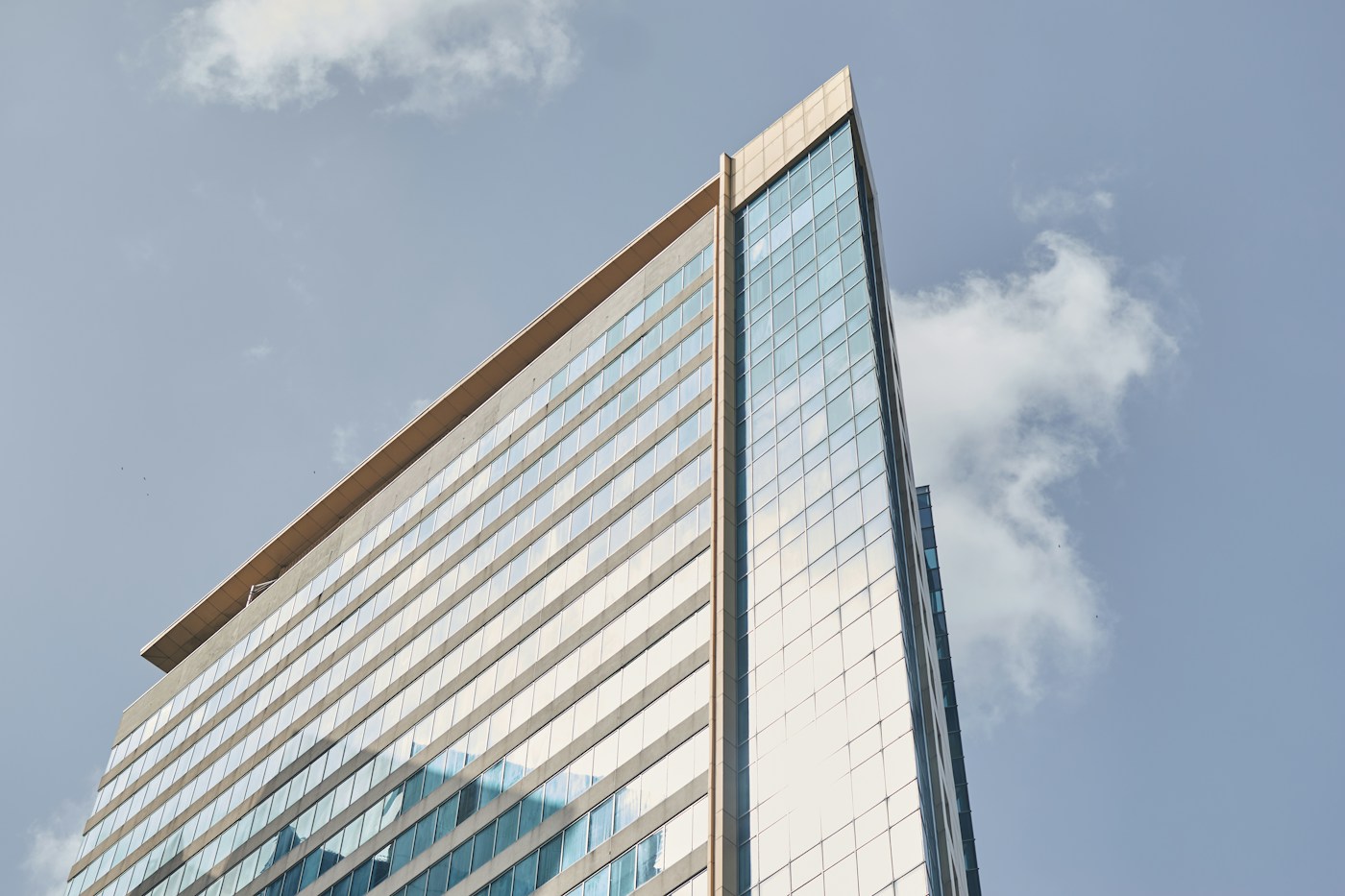 Illustrative glass-fronted office building